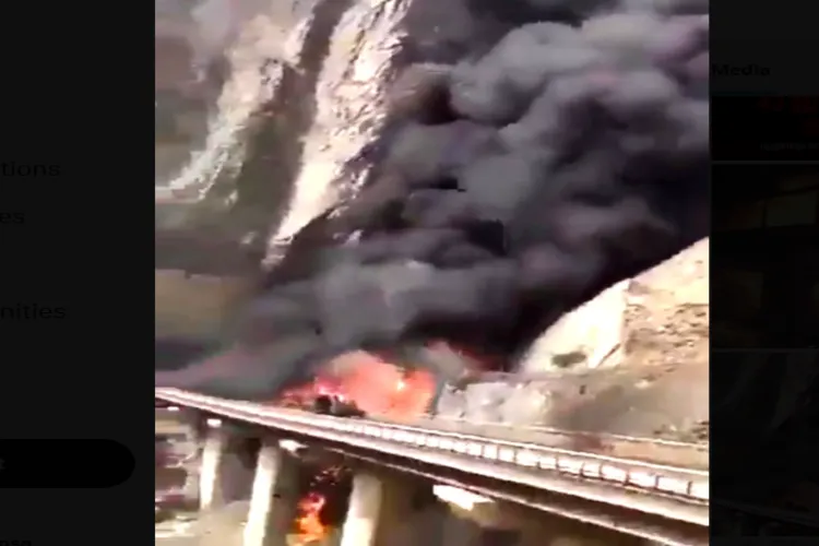 Video grab from an X post of the bus on fire