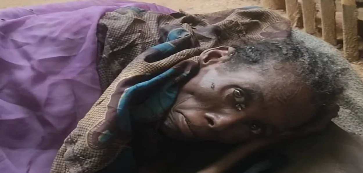 A frail Sudanese woman in a relief camp