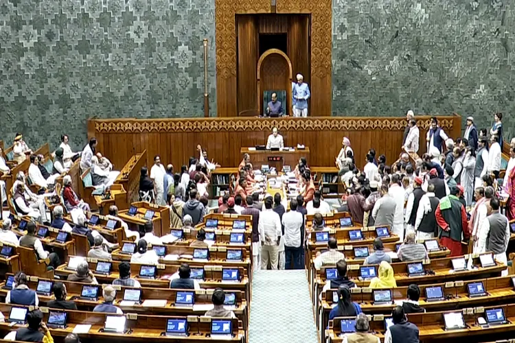 Opposition members on their feet in the Parliament