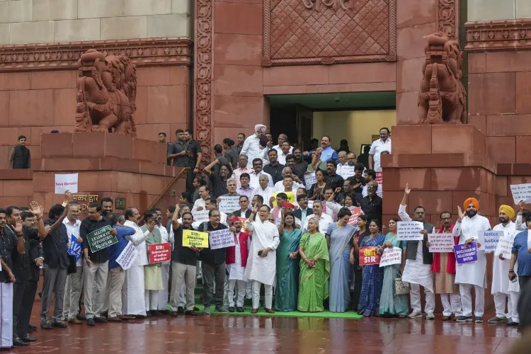 Opposition MPs protest SIR outside Parliament 