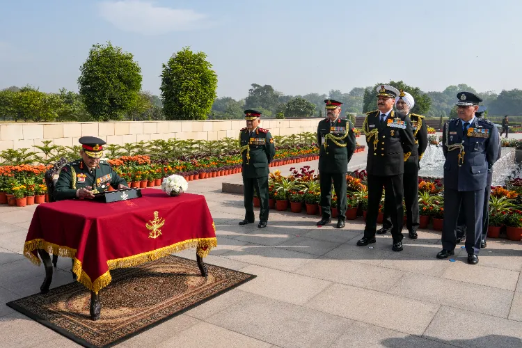 General Anil Chauhan, Lt Gen Pushpendra Singh, Air Marshal Narmdeshwar Tiwari, General Anil Chauhan and Admiral Dinesh K Tripathi during Navy Day observance at National War Memorial