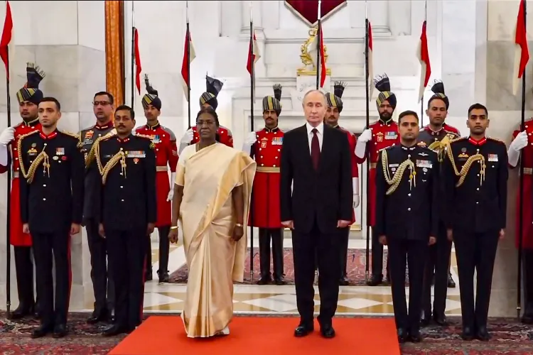 President Vladimir Putin with President Droupadi Murmu at the banquetp
