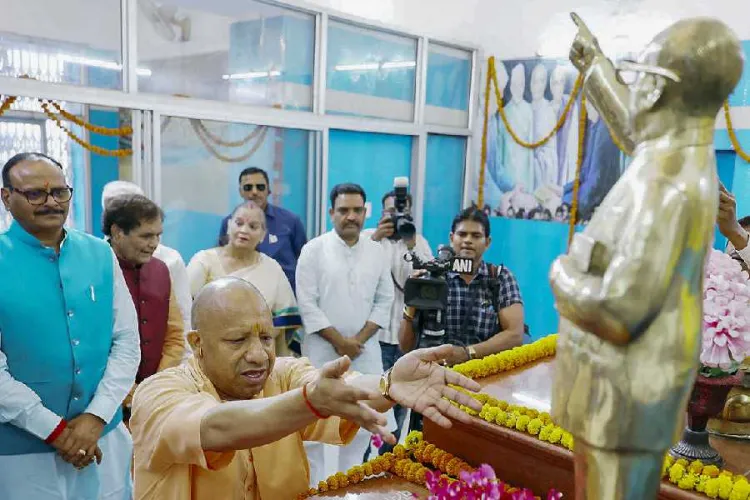 Yogi Adityanath paying tribute to B R Ambedkar