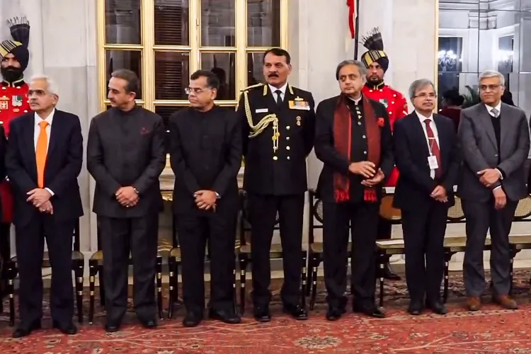 Chief of the Naval Staff Admiral Dinesh Kumar Tripathi, Congress MP Shashi Tharoor and other dignitaries during a state banquet at Rashtrapati Bhavan