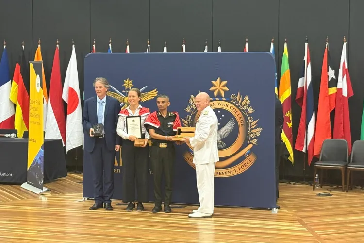 Col Prateek Roy receiving the Geddes Gavel Award on completion of the Defence Strategic and Studies Course at Australian Defence College
