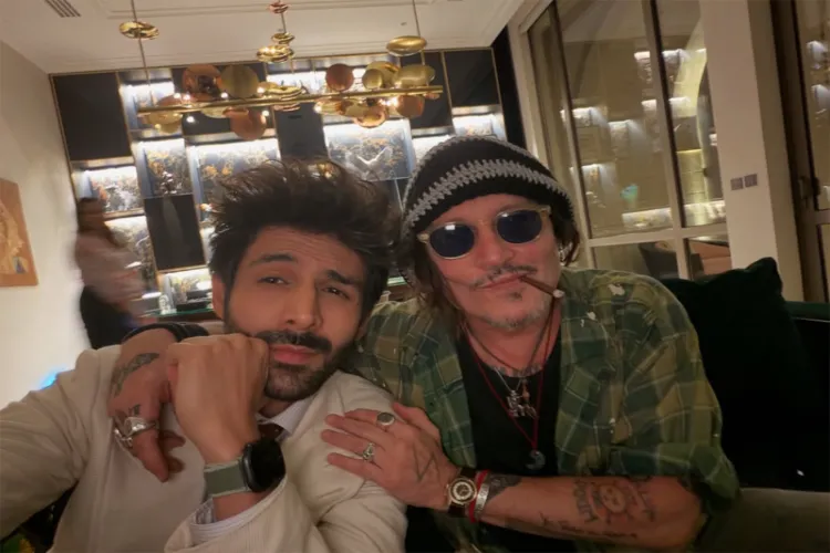 Kartik Aaryan with Johny Depp at Red Sea Film Festival
