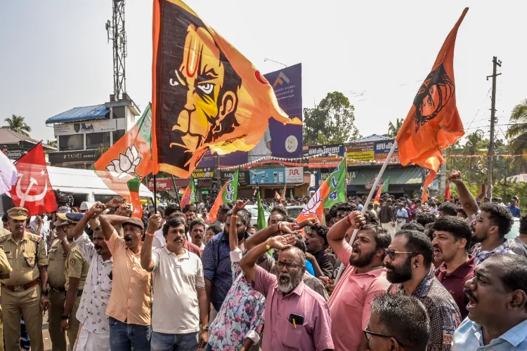  BJP workers celebrate their victory during the Kerala local body polls, at a counting station in Thiruvananthapuram