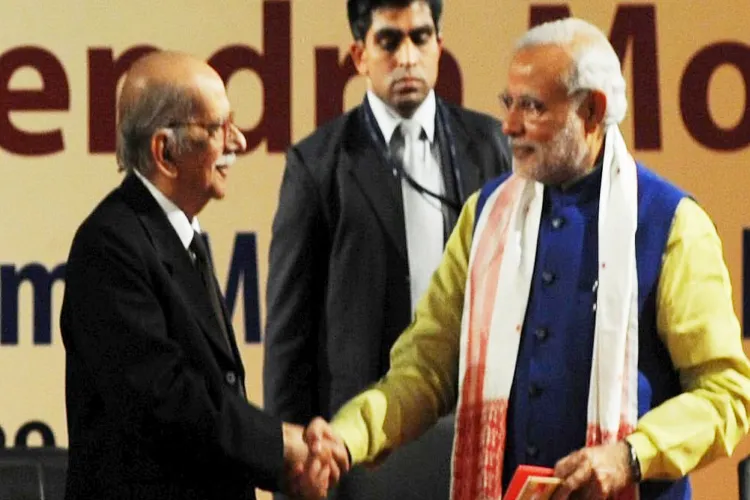 Prime Minister Narendra Modi with P G Baruah, Editor and Managing Director of The Assam Tribune Group