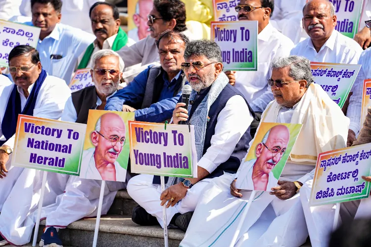 Karnataka Chief Minister Siddaramaiah, centre, Deputy CM DK Shivakumar, left, and other Congress leaders 