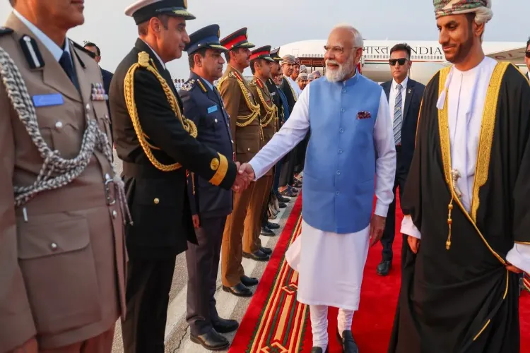 Prime Minister Narendra Modi being welcomed with a cultural performance as he arrives at a hotel, in Oman