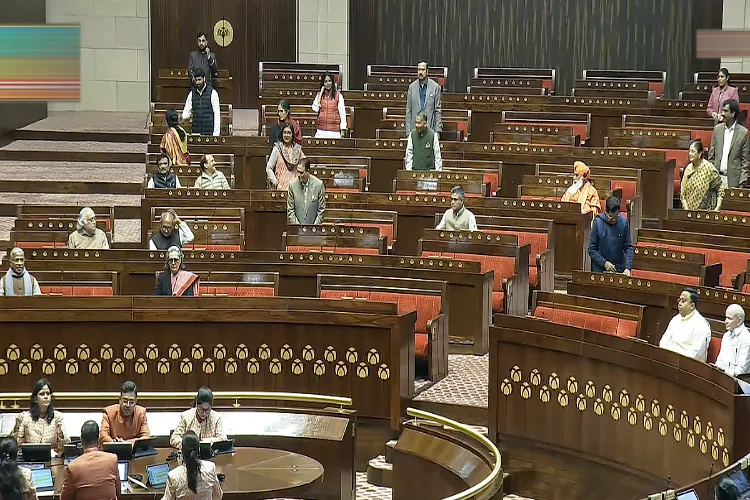 Members of Parliament in the Rajya Sabha during the Winter session of Parliament, in New Delhi