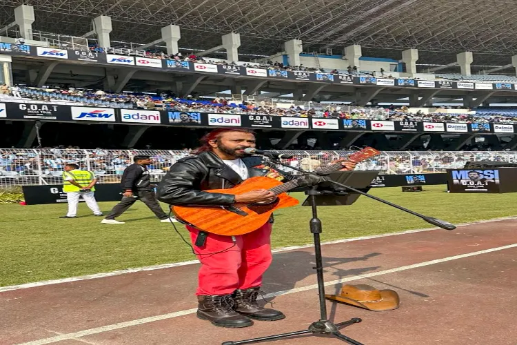 London-based Indian singer Charles Antony performs at Salt Lake Stadium during an event featuring football icon Lionel Messi, in Kolkata