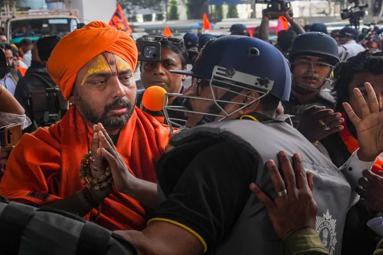 West Bengal Hindu Jagran member during a protest near Bangladesh Deputy High Commission against alleged violence on minority Hindus in the neighbouring country, in Kolkata