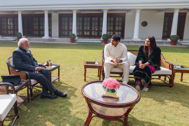 Prime Minister Narendra Modi with Olympic gold medallist javelin thrower Neeraj Chopra and his wife Himani Mor during a meeting, in New Delhi
