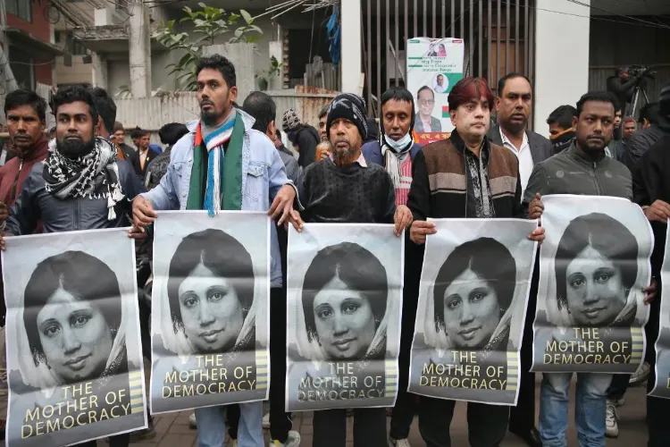 BNP supporters holding placards to mourn the death of Khaleda Zia