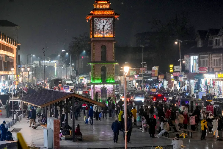 Tourists gather at the Clock Tower ahead of the New Year, in Srinagar