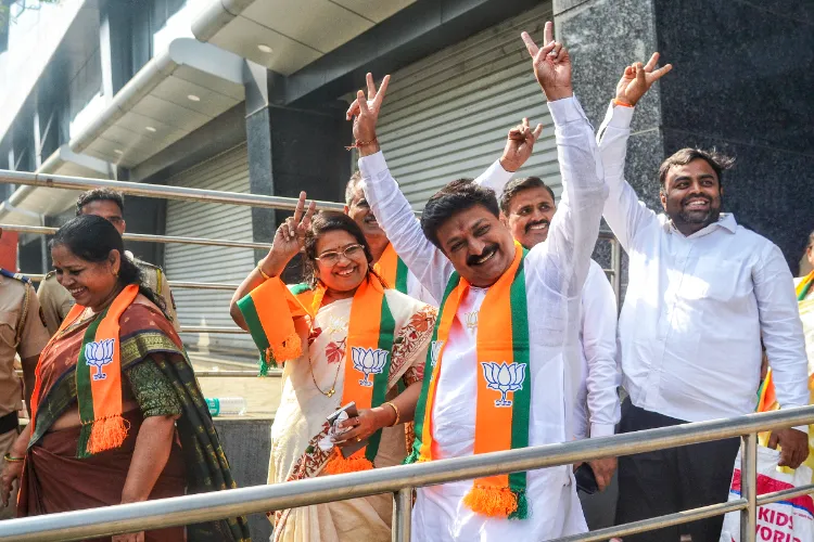 Political party workers gather outside the Election Commission office in Vashi on the final day for submitting nomination forms for the Navi Mumbai Municipal Corporation (NMMC), in Navi Mumbai