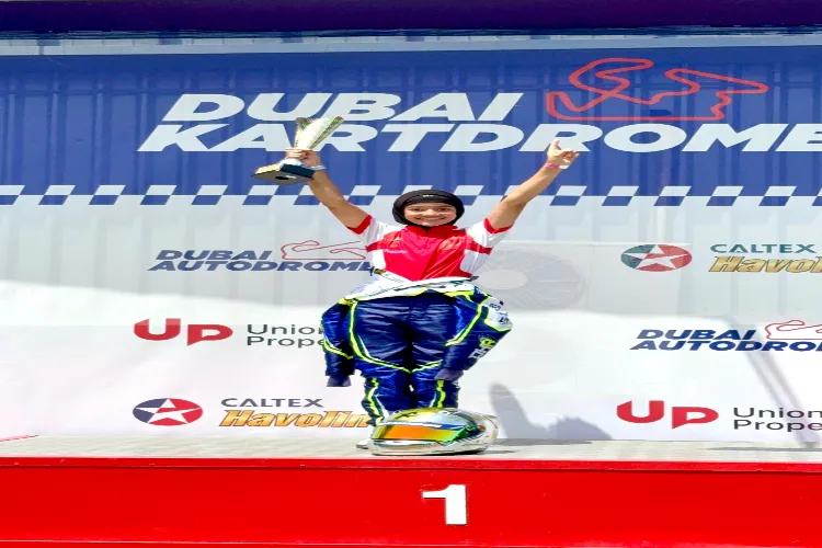 ndian racer Atiqa Mir, 10, celebrates victory in round one of RMC Invitational Karting Series, at Al Ain Raceway, in United Arab Emirates