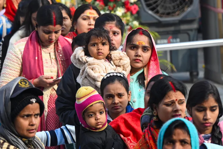 Devotees gather at Mahavir Temple to offer prayers during the New Year celebrations, in Patna