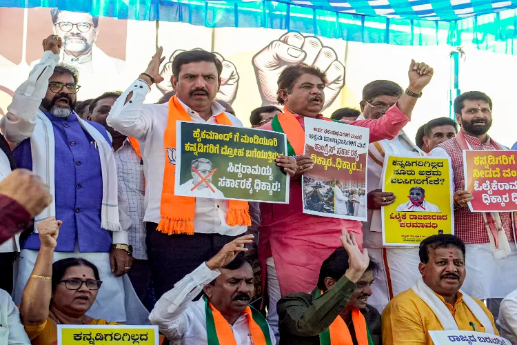Karnataka BJP President B Y Vijayendra, Leader of the Opposition in the Legislative Assembly R Ashoka, Leader of the Opposition in the Legislative Council Chalavadi Narayanaswamy and other party leaders during a protest under the slogan 'Save Kogilu