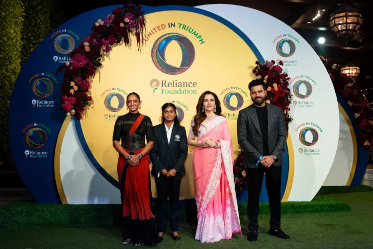 Reliance Foundation founder-chairperson Nita Ambani with cricketer Rohit Sharma