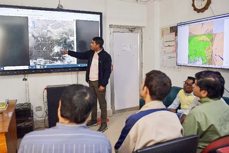 Partha Roy, discusses the cold wave and winter forecast with subordinates and officials at the Weather Forecast Office