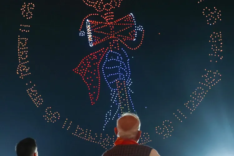 Prime Minister Narendra Modi watching drone show at Somnath temple