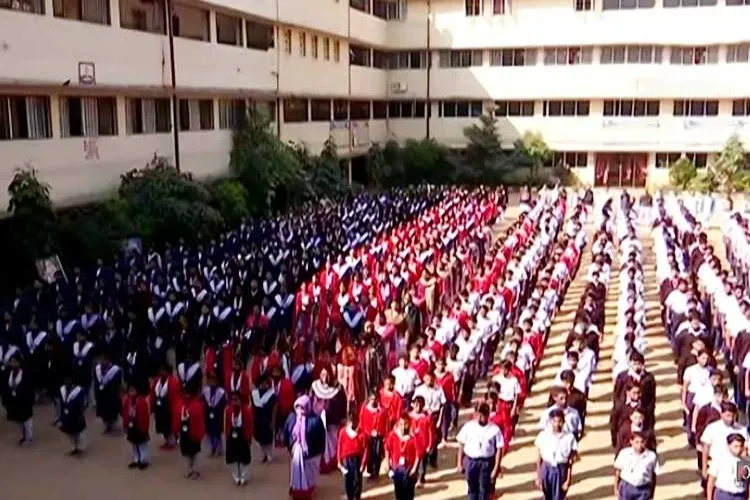 Students singing Vande Mataram in an Odisha school