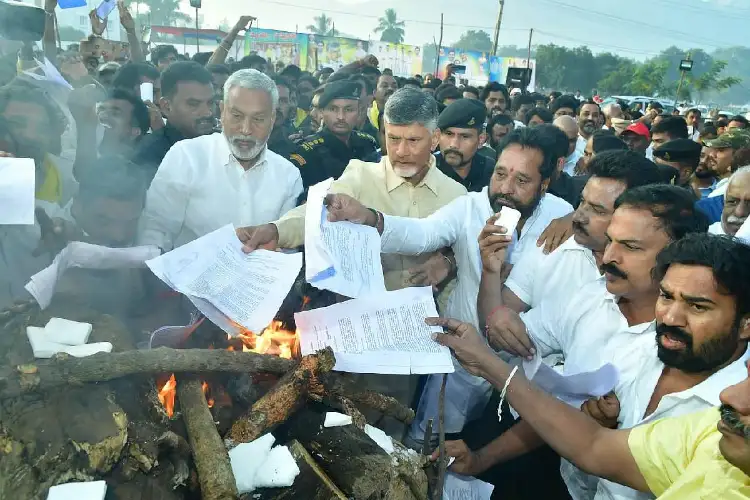 TDP cadre celebrate Bhogi in Vijayawada, burn posters of former CM Jagan Mohan Reddy in traditional bonfires