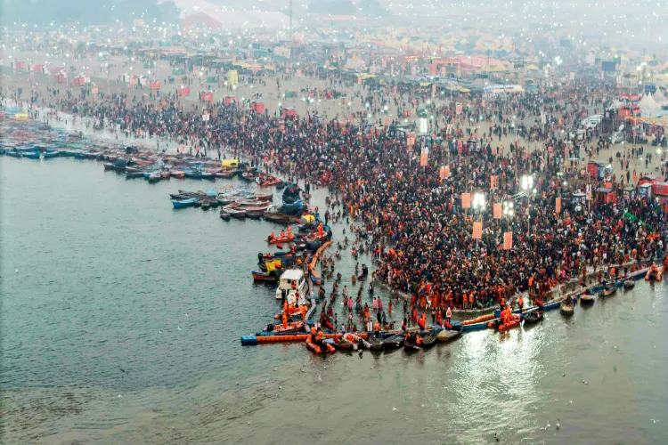 A large number of devotees arrive to take a dip at the Sangam on the occasion of 'Makar Sankranti' during the ongoing Magh Mela