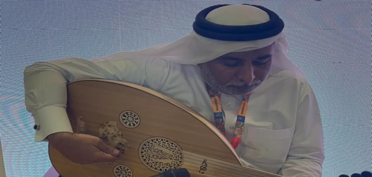 Qatari musician Osama playing Oud at Delhi International Book Fair, 2026 