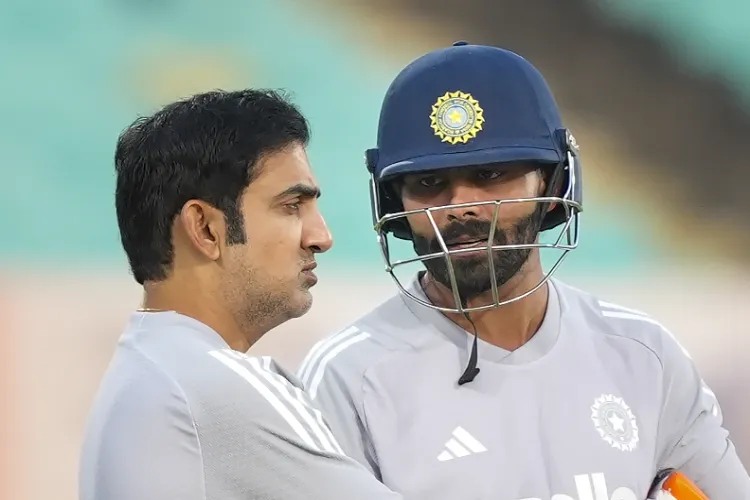 India's Ravindra Jadeja, right, with head coach Gautam Gambhir during a training session ahead of the second ODI cricket match between India and New Zealand, at Niranjan Shah Stadium, in Rajkot, Gujarat
