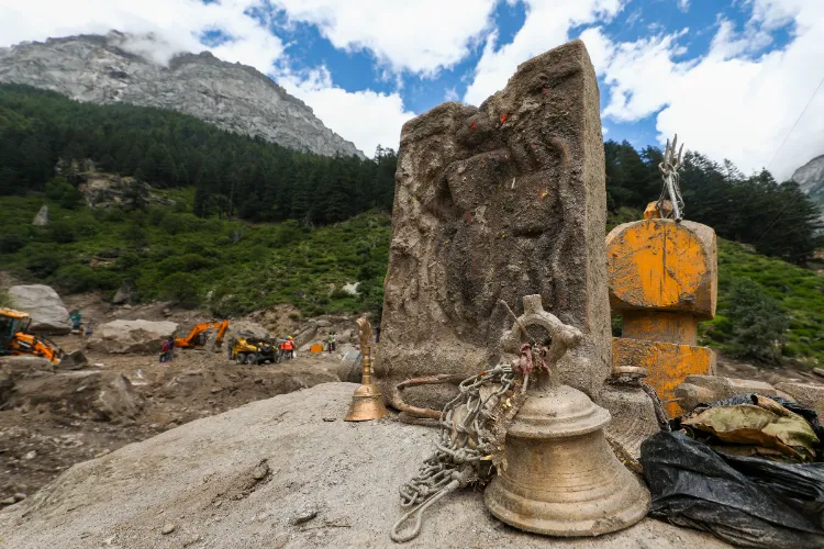 Kishtwar: Temple bells and other things recovered following a cloudburst at Chisoti village, in Kishtwar district, Jammu and Kashmir, Wednesday