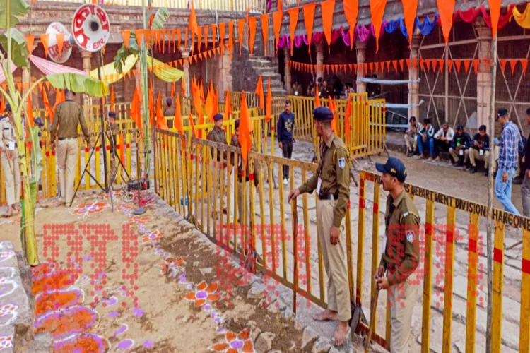 Police personnel stand guard during preparations for Saraswati Puja at the disputed Bhojshala complex, revered as Saraswati temple, on the eve of Basant Panchami, in Dhar, Madhya Pradesh,
