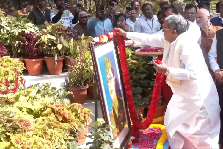 Karnataka Chief Minister Siddaramaiah pays floral tributes to Netaji Subhas Chandra Bose on his 129th birth anniversary in Bengaluru