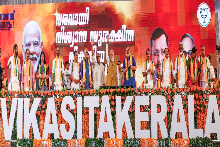 Prime Minister Narendra Modi, centre, with other leaders during a public rally, in Thiruvananthapuram, Kerala. 
