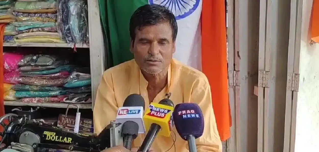 Piyar Ali speaking to media persons at his shop