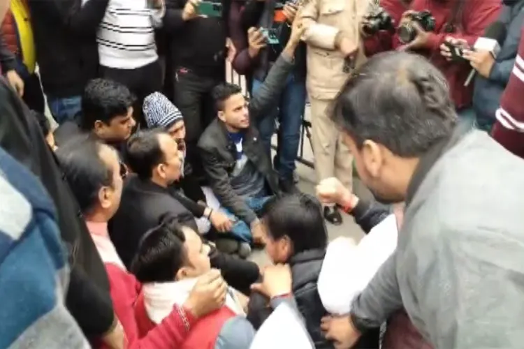 Alankar Agnihotri sits on protest outside DC office in Bareilly 