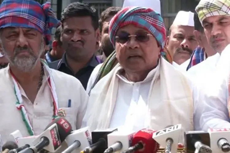 Karnataka CM Siddaramaiah and Deputy CM DK Shivakumar lead Congress delegation to Lok Bhavan in buses for 'Lok Bhavan chalo' protest against VB G RAM G bill. 