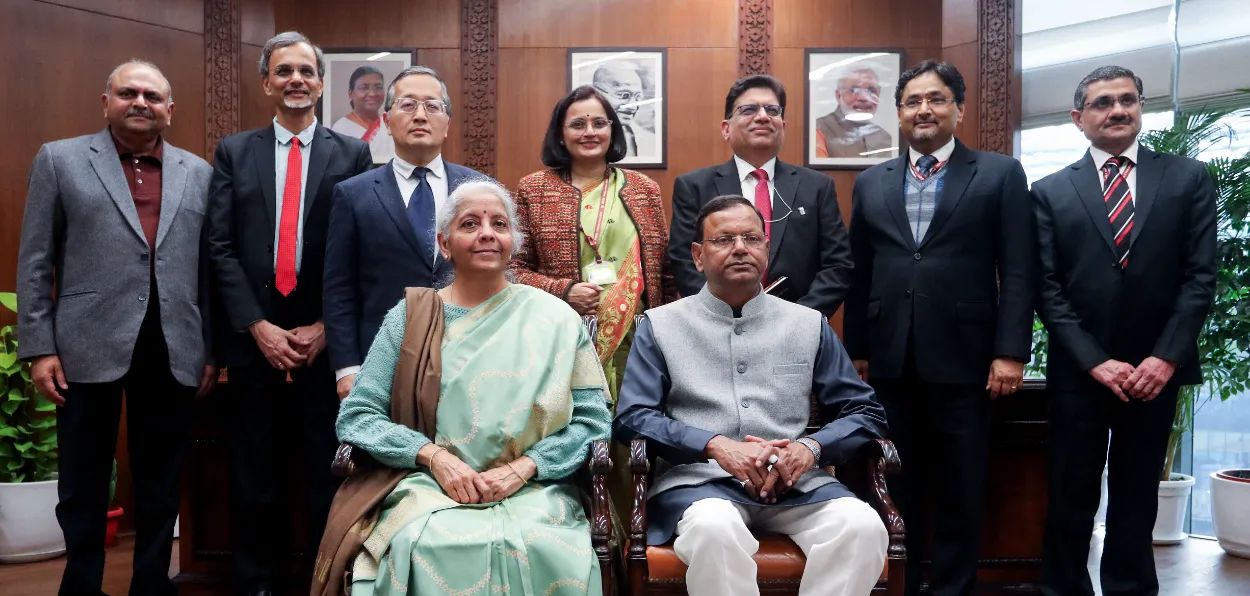 Finance Minister Nirmala Sitharaman posing for a picture with her team after finalising the Union Budget 2026-27