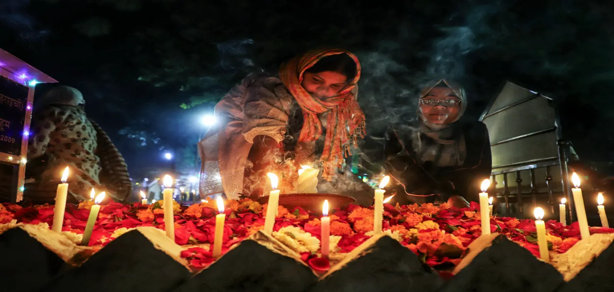 People light candles on the graves of their loved ones on the occasion of Shab-e-Barat, at a graveyard in Lucknow (File)