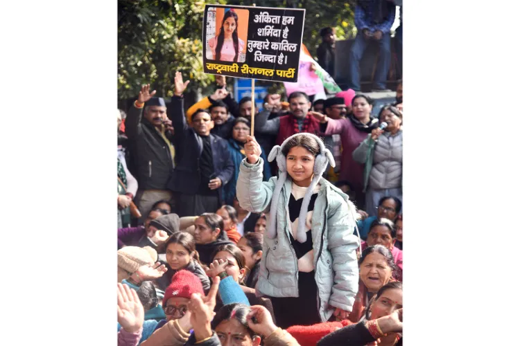A protest for justice for Anikta Bhandari in Dehradun