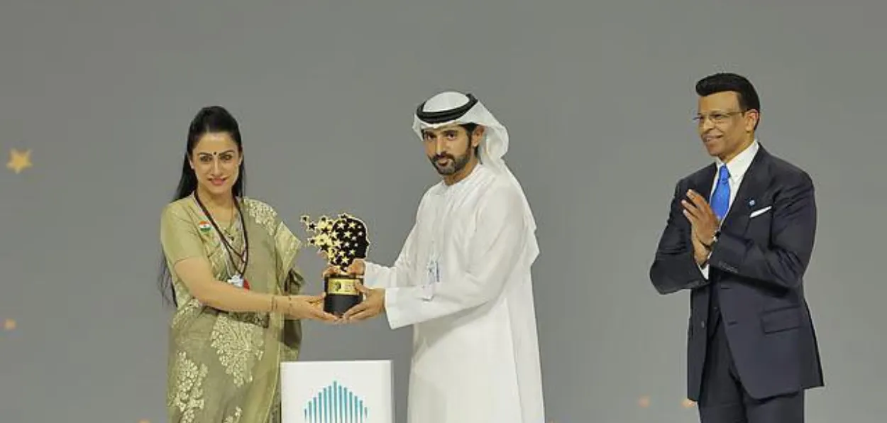 Rouble Nagi receiving  the 2026 GEMS Education Global Teacher Prize at the World Governments Summit in Dubai,here Dubai's Crown Prince Shaikh Hamdan bin Mohammad bin Rashid al Makhtoum