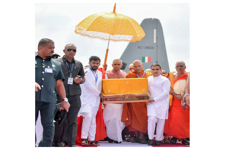 Members of the Indian delegation carry the Holy Devnimori Relics of Lord Buddha 