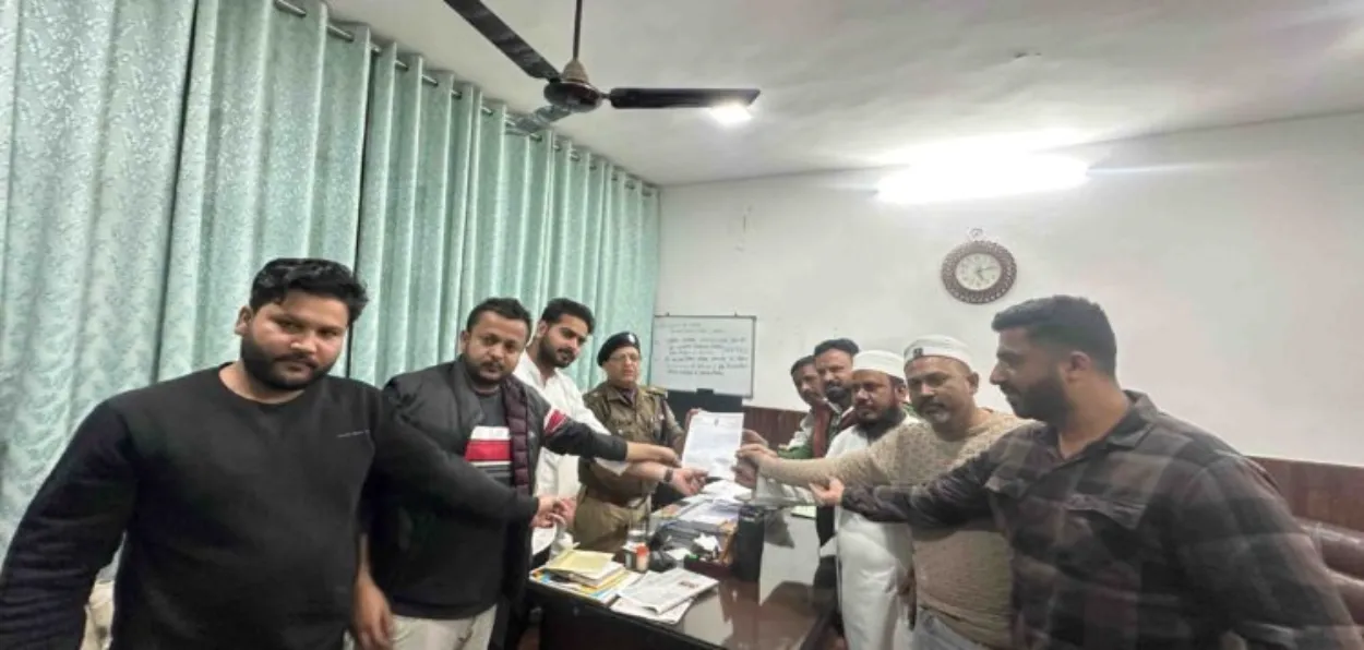 Rohit Prakash leading the locals to Police authorities