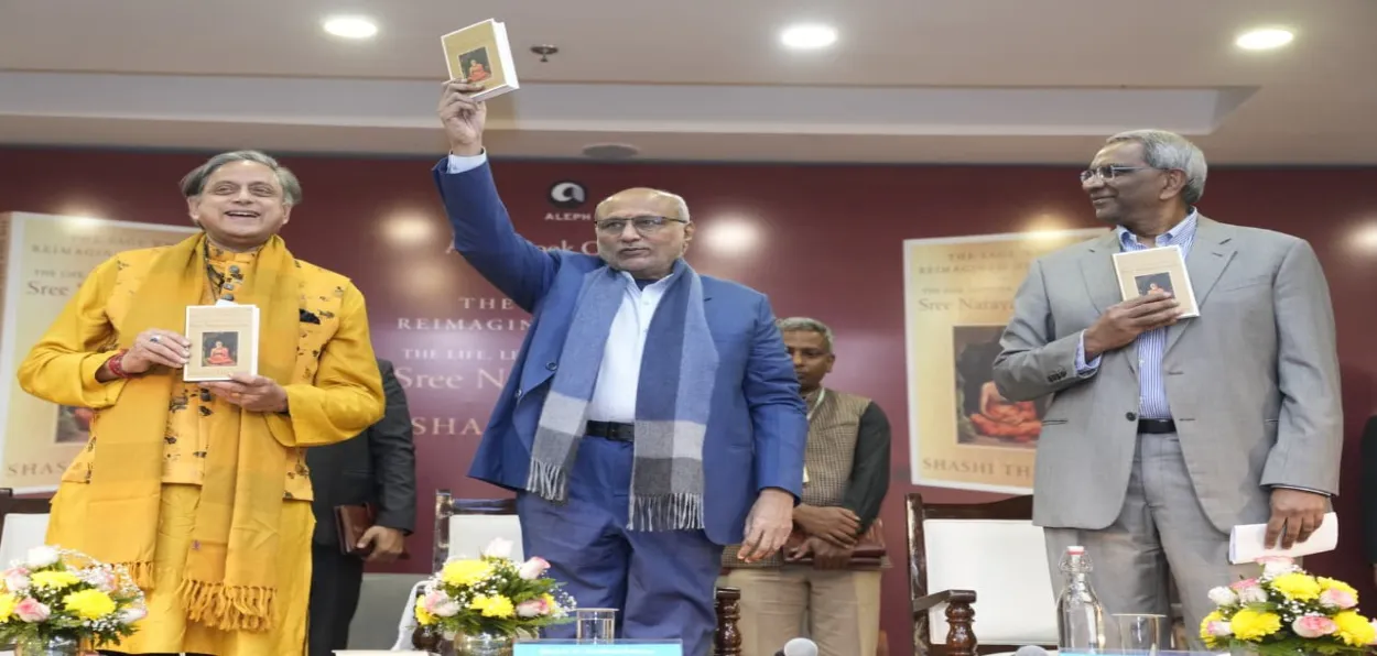Vice President S P Radhakrishnan releasing  Shashi Tharoor's book