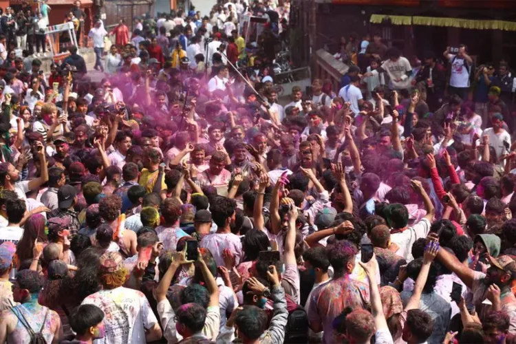 Hundreds of foreign tourists drenched themselves in colours