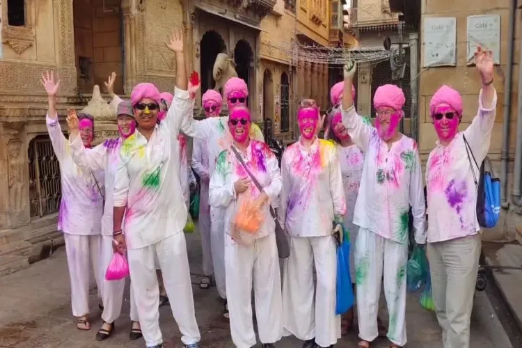 Foreign tourists celebrating Holi in Jaisalmer