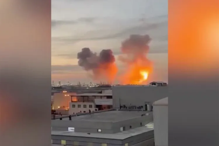 Social media footage shows missiles striking the Bapco Energies refinery in Sitra, Bahrain, with flames and thick smoke rising from the site.