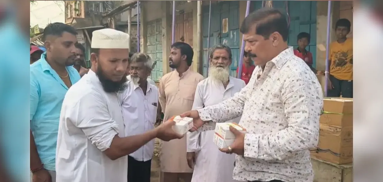Sudiop Roy Barman distributing Iftar food packets in Agartala